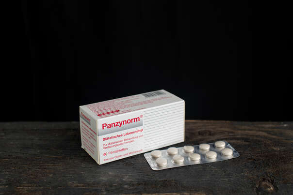 Sie sehen eine Packung Panzynorm Filmtabletten, 60 Stück, Produktbild: 02 Panzynorm Filmtabletten, 60 Stück, A-Nr.: 4020910 - 02